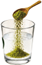 Spoon of Tasty Moringa Health Mix — Added Sugar being mixed into a glass of water or milk